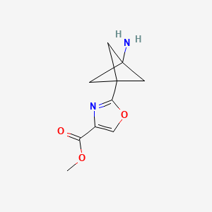 molecular formula C10H12N2O3 B2504996 Methyl 2-(3-aminobicyclo[1.1.1]pent-1-yl)-1,3-oxazole-4-carboxylate CAS No. 1980053-94-8