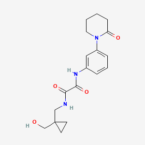 molecular formula C18H23N3O4 B2508271 N-{[1-(hydroxymethyl)cyclopropyl]methyl}-N'-[3-(2-oxopiperidin-1-yl)phenyl]ethanediamide CAS No. 1251552-98-3