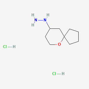 {6-Oxaspiro[4.5]decan-9-yl}hydrazine dihydrochloride