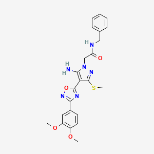 molecular formula C23H24N6O4S B2509915 2-{5-amino-4-[3-(3,4-dimethoxyphenyl)-1,2,4-oxadiazol-5-yl]-3-(methylsulfanyl)-1H-pyrazol-1-yl}-N-benzylacetamide CAS No. 1019099-04-7