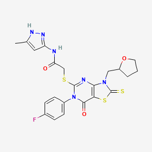 2-{[6-(4-fluorophenyl)-7-oxo-3-[(oxolan-2-yl)methyl]-2-sulfanylidene-2H,3H,6H,7H-[1,3]thiazolo[4,5-d]pyrimidin-5-yl]sulfanyl}-N-(3-methyl-1H-pyrazol-5-yl)acetamide