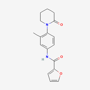 molecular formula C17H18N2O3 B2511331 N-[3-methyl-4-(2-oxopiperidin-1-yl)phenyl]furan-2-carboxamide CAS No. 941918-70-3
