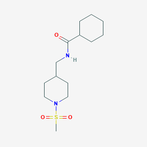 molecular formula C14H26N2O3S B2511575 N-[(1-methanesulfonylpiperidin-4-yl)methyl]cyclohexanecarboxamide CAS No. 1235015-96-9
