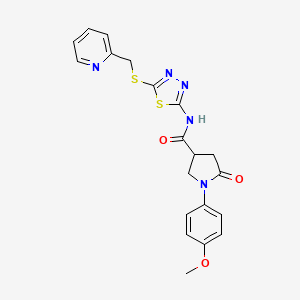 B2512277 1-(4-methoxyphenyl)-5-oxidanylidene-N-[5-(pyridin-2-ylmethylsulfanyl)-1,3,4-thiadiazol-2-yl]pyrrolidine-3-carboxamide CAS No. 872595-39-6