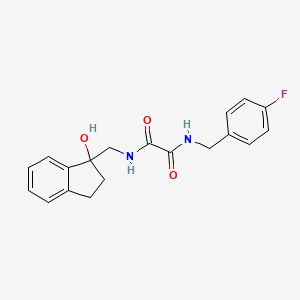 molecular formula C19H19FN2O3 B2513091 N'-[(4-fluorophenyl)methyl]-N-[(1-hydroxy-2,3-dihydro-1H-inden-1-yl)methyl]ethanediamide CAS No. 1351594-80-3
