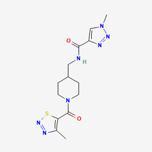 molecular formula C14H19N7O2S B2514333 1-methyl-N-((1-(4-methyl-1,2,3-thiadiazole-5-carbonyl)piperidin-4-yl)methyl)-1H-1,2,3-triazole-4-carboxamide CAS No. 1797076-47-1