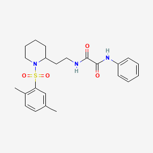 molecular formula C23H29N3O4S B2516349 N-{2-[1-(2,5-dimethylbenzenesulfonyl)piperidin-2-yl]ethyl}-N'-phenylethanediamide CAS No. 898461-32-0