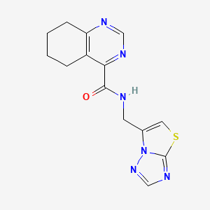 molecular formula C14H14N6OS B2516658 N-({[1,2,4]triazolo[3,2-b][1,3]thiazol-6-yl}methyl)-5,6,7,8-tetrahydroquinazoline-4-carboxamide CAS No. 2415552-55-3