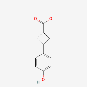 Methyl 3-(4-hydroxyphenyl)cyclobutane-1-carboxylate