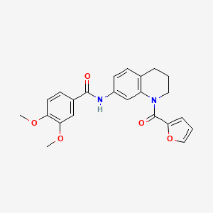 molecular formula C23H22N2O5 B2519244 N-[1-(furan-2-carbonyl)-1,2,3,4-tetrahydroquinolin-7-yl]-3,4-dimethoxybenzamide CAS No. 946367-53-9