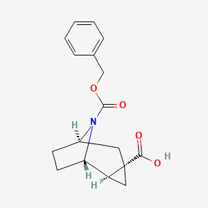 (1S,2R,4S,6R)-9-Phenylmethoxycarbonyl-9-azatricyclo[4.2.1.02,4]nonane-4-carboxylic acid