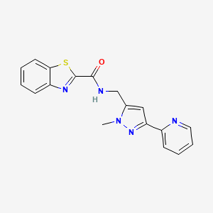 molecular formula C18H15N5OS B2519651 N-[(2-Methyl-5-pyridin-2-ylpyrazol-3-yl)methyl]-1,3-benzothiazole-2-carboxamide CAS No. 2309340-46-1