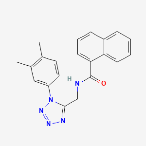 B2519705 N-[[1-(3,4-dimethylphenyl)tetrazol-5-yl]methyl]naphthalene-1-carboxamide CAS No. 897622-42-3