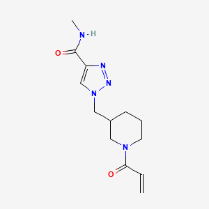 B2521666 N-Methyl-1-[(1-prop-2-enoylpiperidin-3-yl)methyl]triazole-4-carboxamide CAS No. 2361657-41-0