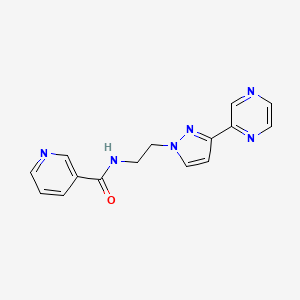 molecular formula C15H14N6O B2525086 N-(2-(3-(pyrazin-2-yl)-1H-pyrazol-1-yl)ethyl)nicotinamide CAS No. 2034504-79-3