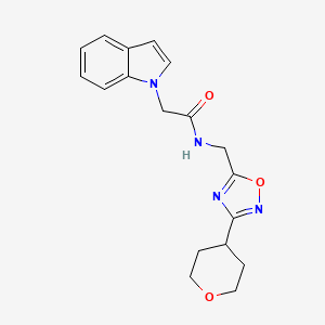 molecular formula C18H20N4O3 B2528380 2-(1H-indol-1-yl)-N-((3-(tetrahydro-2H-pyran-4-yl)-1,2,4-oxadiazol-5-yl)methyl)acetamide CAS No. 2034534-63-7