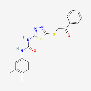 molecular formula C19H18N4O2S2 B2529420 1-(3,4-Dimethylphenyl)-3-(5-((2-oxo-2-phenylethyl)thio)-1,3,4-thiadiazol-2-yl)urea CAS No. 922571-68-4