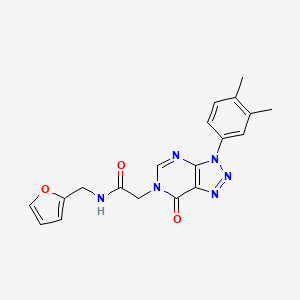 molecular formula C19H18N6O3 B2530246 2-[3-(3,4-dimethylphenyl)-7-oxo-3H,6H,7H-[1,2,3]triazolo[4,5-d]pyrimidin-6-yl]-N-[(furan-2-yl)methyl]acetamide CAS No. 888421-88-3