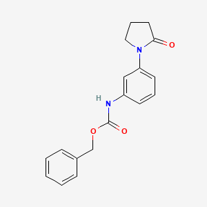 molecular formula C18H18N2O3 B2530813 benzyl N-[3-(2-oxopyrrolidin-1-yl)phenyl]carbamate CAS No. 923103-80-4