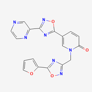 molecular formula C18H11N7O4 B2535565 1-((5-(furan-2-yl)-1,2,4-oxadiazol-3-yl)methyl)-5-(3-(pyrazin-2-yl)-1,2,4-oxadiazol-5-yl)pyridin-2(1H)-one CAS No. 1396855-28-9
