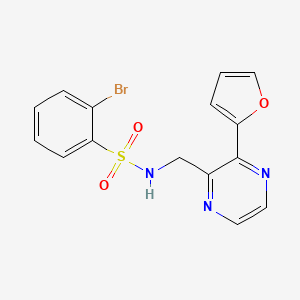 2-bromo-N-((3-(furan-2-yl)pyrazin-2-yl)methyl)benzenesulfonamide