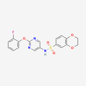molecular formula C18H14FN3O5S B2539372 N-[2-(2-FLUOROPHENOXY)PYRIMIDIN-5-YL]-2,3-DIHYDRO-1,4-BENZODIOXINE-6-SULFONAMIDE CAS No. 1421455-22-2