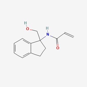 N-[1-(Hydroxymethyl)-2,3-dihydroinden-1-yl]prop-2-enamide