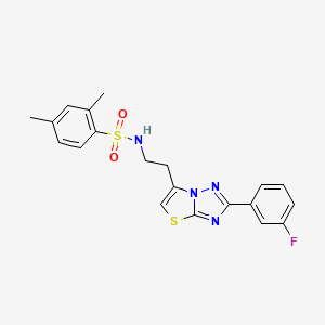 molecular formula C20H19FN4O2S2 B2542264 N-{2-[2-(3-fluorophenyl)-[1,2,4]triazolo[3,2-b][1,3]thiazol-6-yl]ethyl}-2,4-dimethylbenzene-1-sulfonamide CAS No. 946206-66-2