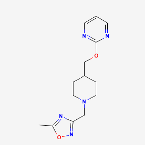 B2542612 5-Methyl-3-[[4-(pyrimidin-2-yloxymethyl)piperidin-1-yl]methyl]-1,2,4-oxadiazole CAS No. 2379997-39-2