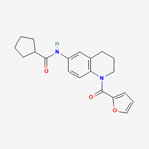 molecular formula C20H22N2O3 B2543653 N-[1-(furan-2-carbonyl)-1,2,3,4-tetrahydroquinolin-6-yl]cyclopentanecarboxamide CAS No. 941915-50-0
