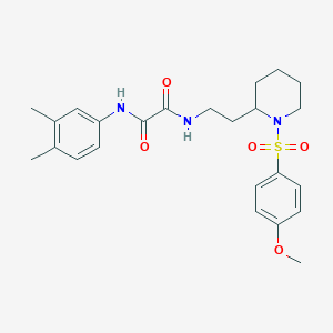 molecular formula C24H31N3O5S B2543696 N'-(3,4-dimethylphenyl)-N-{2-[1-(4-methoxybenzenesulfonyl)piperidin-2-yl]ethyl}ethanediamide CAS No. 898450-70-9