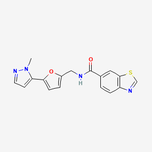 molecular formula C17H14N4O2S B2543961 N-{[5-(1-methyl-1H-pyrazol-5-yl)furan-2-yl]methyl}-1,3-benzothiazole-6-carboxamide CAS No. 2415526-20-2