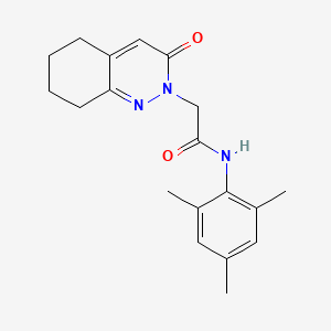 B2544989 2-(3-oxo-5,6,7,8-tetrahydrocinnolin-2(3H)-yl)-N-(2,4,6-trimethylphenyl)acetamide CAS No. 932971-91-0