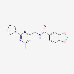 molecular formula C18H20N4O3 B2547648 N-{[6-methyl-2-(pyrrolidin-1-yl)pyrimidin-4-yl]methyl}-2H-1,3-benzodioxole-5-carboxamide CAS No. 1797330-51-8