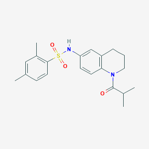 molecular formula C21H26N2O3S B2549004 2,4-dimethyl-N-[1-(2-methylpropanoyl)-1,2,3,4-tetrahydroquinolin-6-yl]benzene-1-sulfonamide CAS No. 1005293-31-1