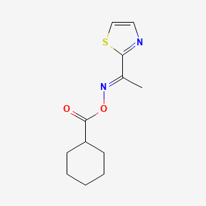molecular formula C12H16N2O2S B2549261 [(E)-1-(1,3-thiazol-2-yl)ethylideneamino] cyclohexanecarboxylate 