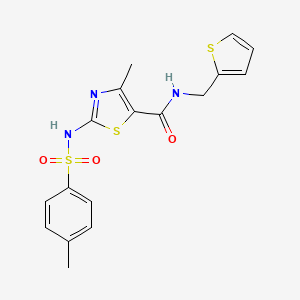 4-methyl-2-(4-methylphenylsulfonamido)-N-(thiophen-2-ylmethyl)thiazole-5-carboxamide