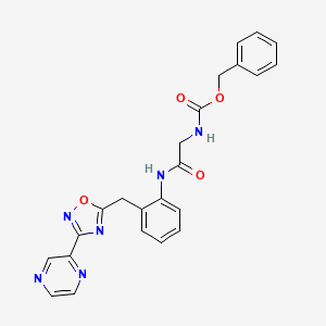 molecular formula C23H20N6O4 B2550110 Benzyl (2-oxo-2-((2-((3-(pyrazin-2-yl)-1,2,4-oxadiazol-5-yl)methyl)phenyl)amino)ethyl)carbamate CAS No. 2034513-03-4