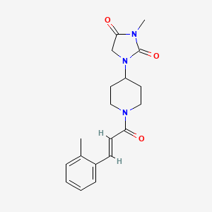 (E)-3-methyl-1-(1-(3-(o-tolyl)acryloyl)piperidin-4-yl)imidazolidine-2,4-dione