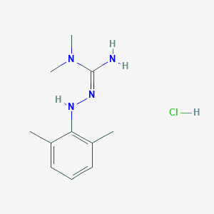 molecular formula C11H18N4.ClH B025507 Restacorin CAS No. 100751-82-4