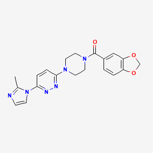 molecular formula C20H20N6O3 B2554498 3-[4-(2H-1,3-benzodioxole-5-carbonyl)piperazin-1-yl]-6-(2-methyl-1H-imidazol-1-yl)pyridazine CAS No. 1396883-08-1