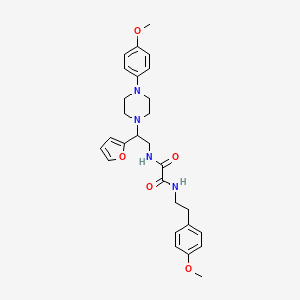 molecular formula C28H34N4O5 B2557563 N-[2-(furan-2-yl)-2-[4-(4-methoxyphenyl)piperazin-1-yl]ethyl]-N'-[2-(4-methoxyphenyl)ethyl]ethanediamide CAS No. 877634-38-3