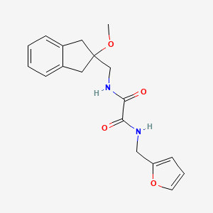 molecular formula C18H20N2O4 B2560797 N'-[(furan-2-yl)methyl]-N-[(2-methoxy-2,3-dihydro-1H-inden-2-yl)methyl]ethanediamide CAS No. 1903759-16-9