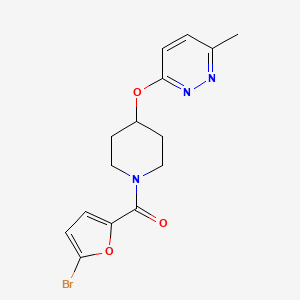 molecular formula C15H16BrN3O3 B2561471 (5-Bromofuran-2-yl)(4-((6-methylpyridazin-3-yl)oxy)piperidin-1-yl)methanone CAS No. 1797755-77-1
