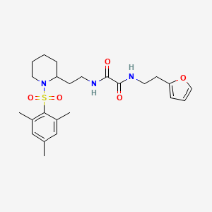 molecular formula C24H33N3O5S B2562807 N1-(2-(furan-2-yl)ethyl)-N2-(2-(1-(mesitylsulfonyl)piperidin-2-yl)ethyl)oxalamide CAS No. 898451-04-2
