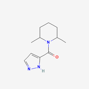 molecular formula C11H17N3O B2563672 2,6-dimethyl-1-(1H-pyrazole-3-carbonyl)piperidine CAS No. 2327007-84-9
