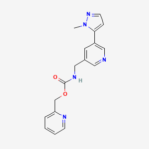 molecular formula C17H17N5O2 B2564592 (pyridin-2-yl)methyl N-{[5-(1-methyl-1H-pyrazol-5-yl)pyridin-3-yl]methyl}carbamate CAS No. 2034463-37-9