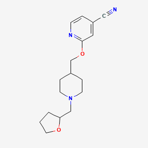 molecular formula C17H23N3O2 B2564900 2-[[1-(Oxolan-2-ylmethyl)piperidin-4-yl]methoxy]pyridine-4-carbonitrile CAS No. 2415462-55-2