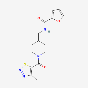 molecular formula C15H18N4O3S B2565006 N-((1-(4-methyl-1,2,3-thiadiazole-5-carbonyl)piperidin-4-yl)methyl)furan-2-carboxamide CAS No. 1235347-60-0