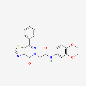 molecular formula C22H18N4O4S B2565232 N-(2,3-dihydro-1,4-benzodioxin-6-yl)-2-{2-methyl-4-oxo-7-phenyl-4H,5H-[1,3]thiazolo[4,5-d]pyridazin-5-yl}acetamide CAS No. 941986-36-3